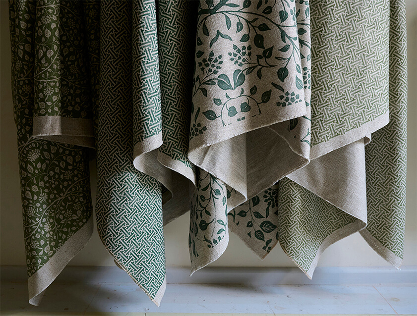 Spill Resistant RHS fabric drapes in greens